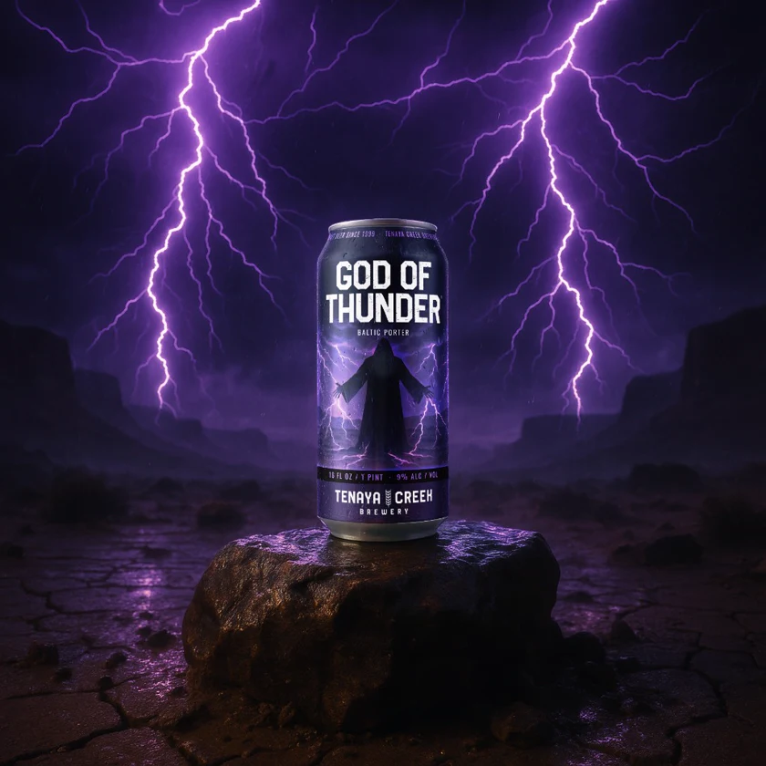 God of Thunder can on a desert rock under purple lightning
